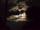 Super moon behind the clouds