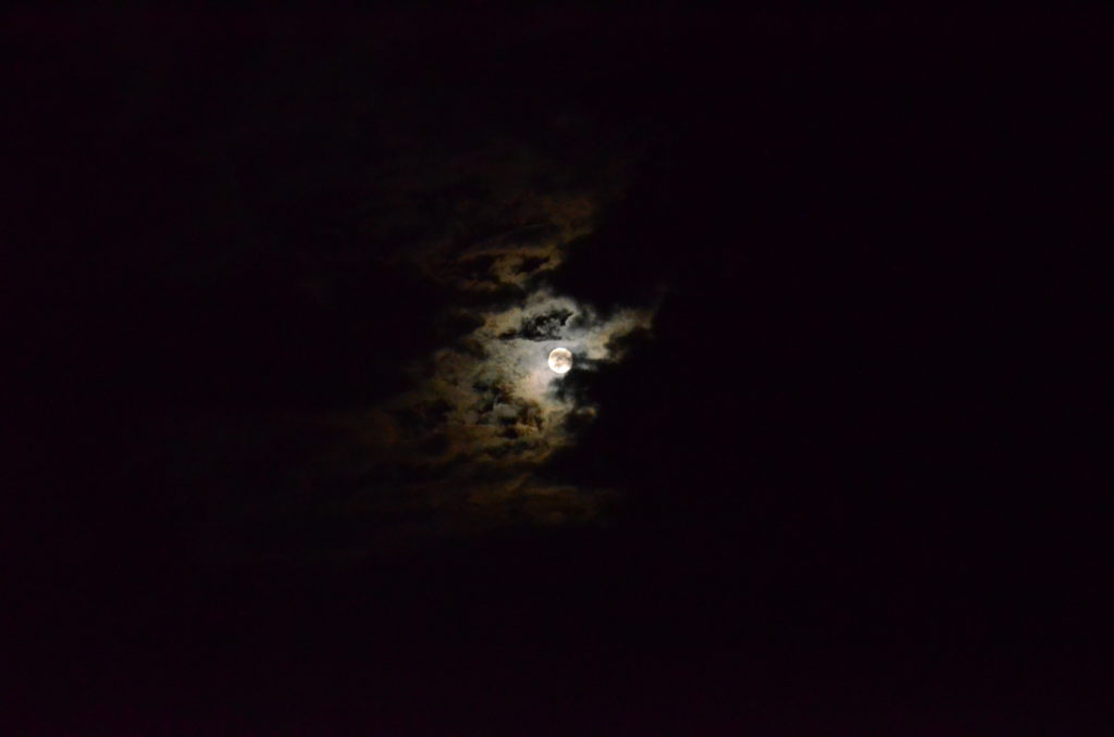 Super moon behind the clouds