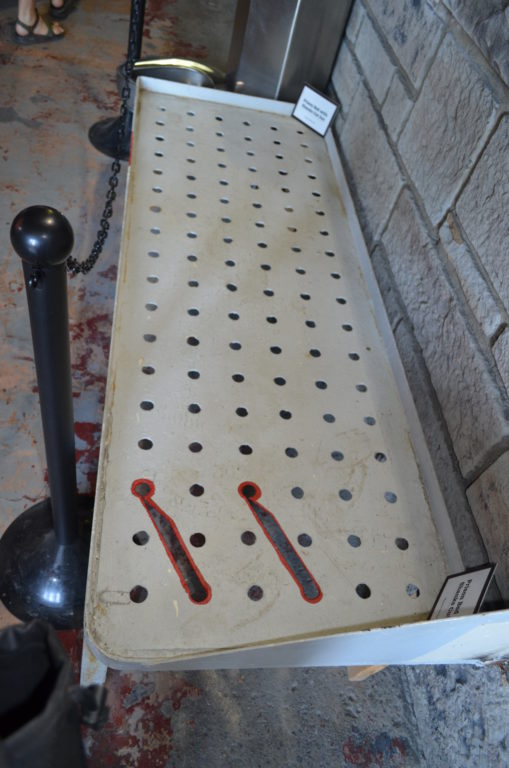 Prison bed with shanks cut out